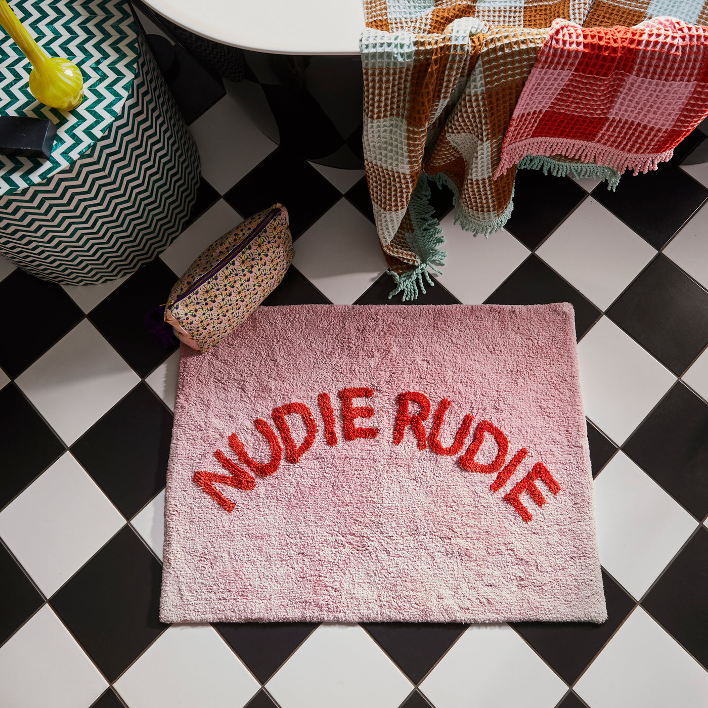 Tula hand tufted nudie rudie bath mat in lilac and red